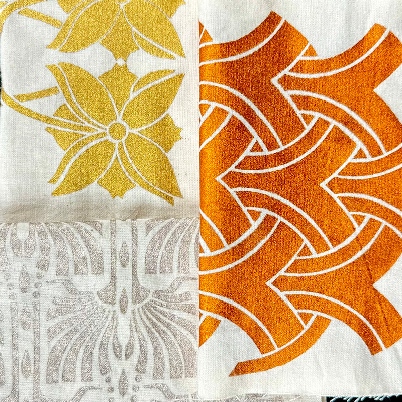 Three pieces of canvas painted in the Super GILD metallic paint set