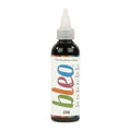 A bottle containing coloured gel paint, on a white background of bleo coal