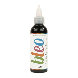 A bottle containing coloured gel paint, on a white background of bleo coal