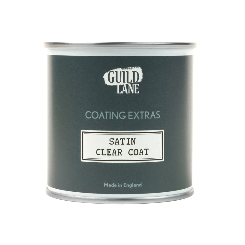 A jar of Guild Lane Satin Clear Coat, a coating extras product, with the label indicating it is made in England.