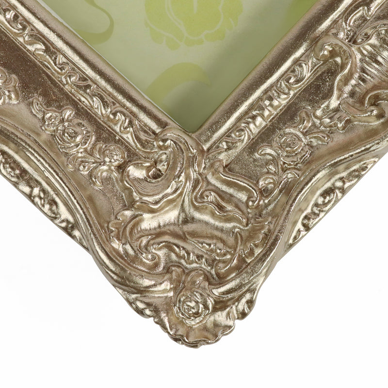 Champagne painted corner of a photo frame ornate style