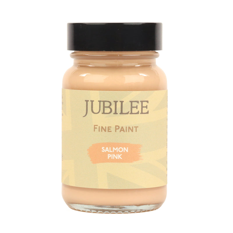 A jar of Jubilee fine paint in Salmon Pink colour, alongside a paint swatch showing the colour applied to a surface.